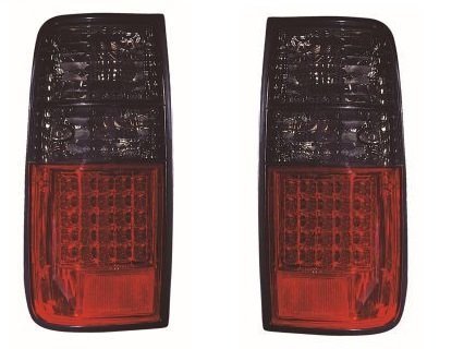 COPPIA FANALI POSTERIORI TOYOTA LAND CRUISER HDJ80/ HZJ80/ FJ80/ FZJ80 (GRIGIO FUMO) - Autoricambi4x4