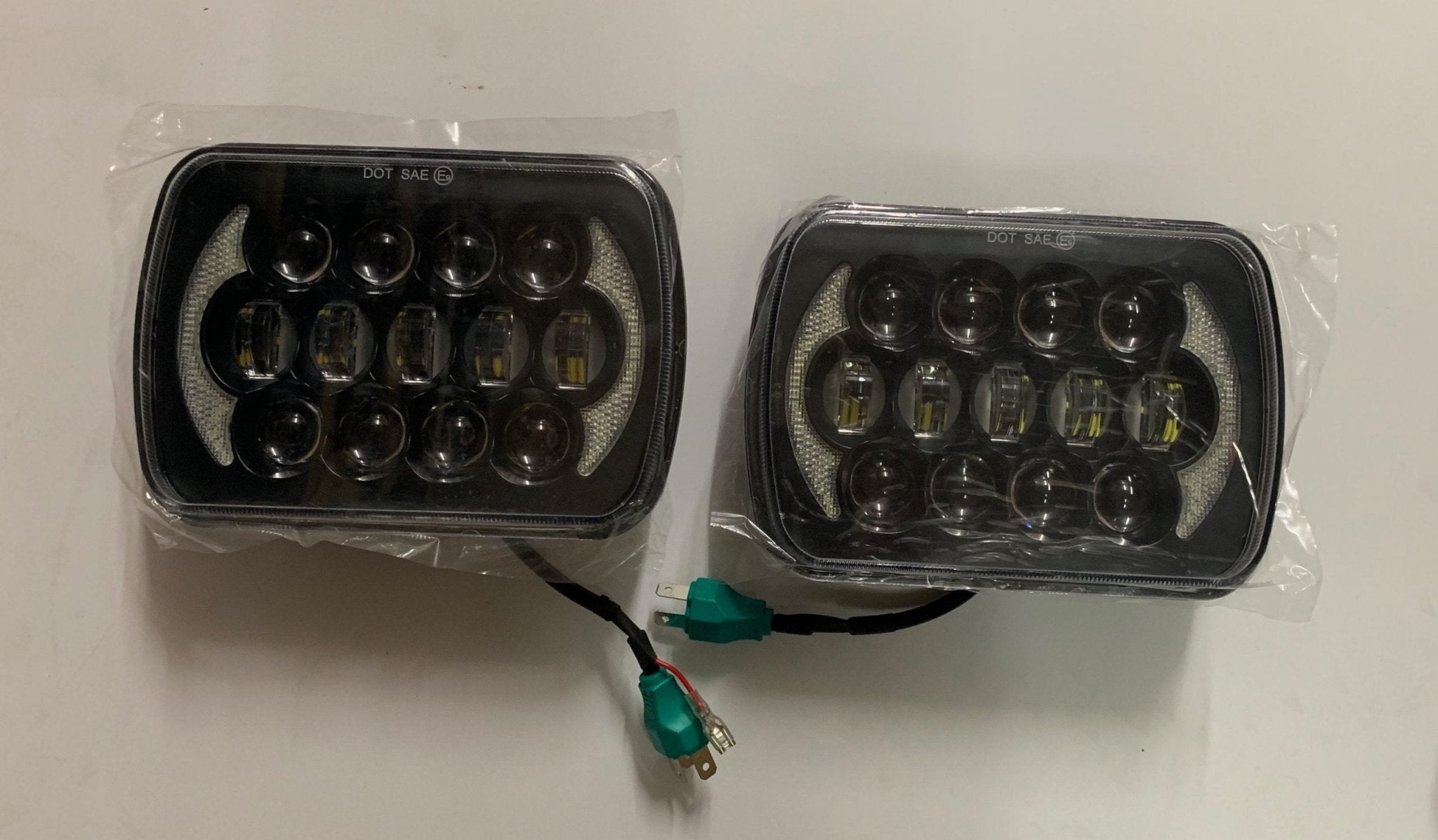 COPPIA FARI FULL LED 105W RETTANGOLARI PER FUORISTRADA NISSAN - MITSUBISHI - JEEP - TOYOTA - LAND ROVER - SUZUKI - Autoricambi4x4