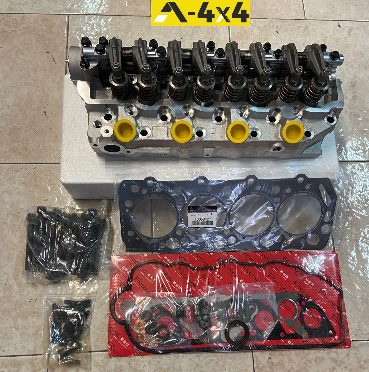 KIT TESTATA MOTORE COMPLETA VALVOLE INCASSATE/ SERIE GUARNIZIONI SMERIGLIO/ GUARNIZIONE TESTATA ORIGINALE/ BULLONI TESTATA MITSUBISHI PAJERO II /L200 2.5TD - Autoricambi4x4