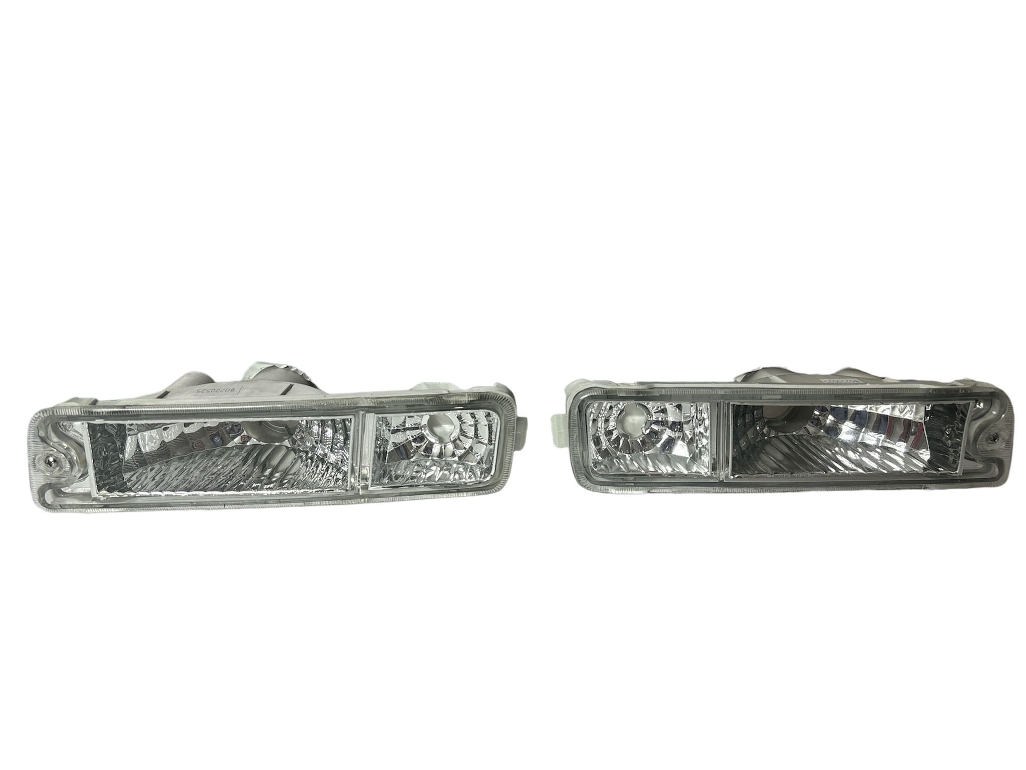 COPPIA FANALI PARAURTI ANTERIORE MITSUBISHI L200 DAL 1996 AL 2007 (CRYSTAL) - Autoricambi4x4