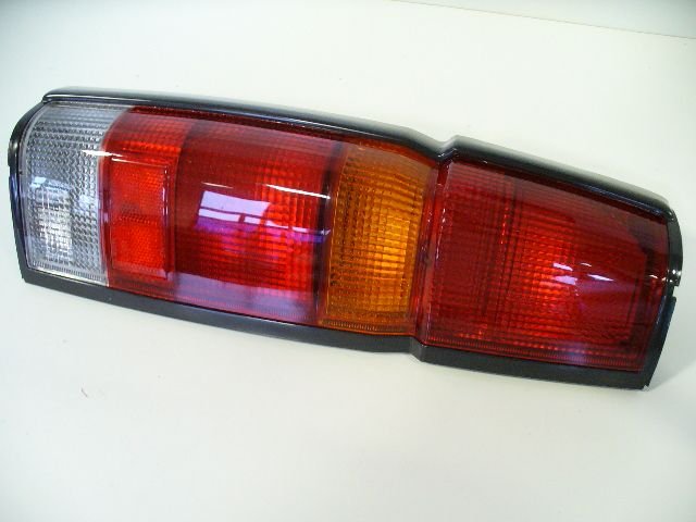 FANALE POSTERIORE SINISTRO NISSAN KING CAB (ORIGINALE) 4 luci - Autoricambi4x4